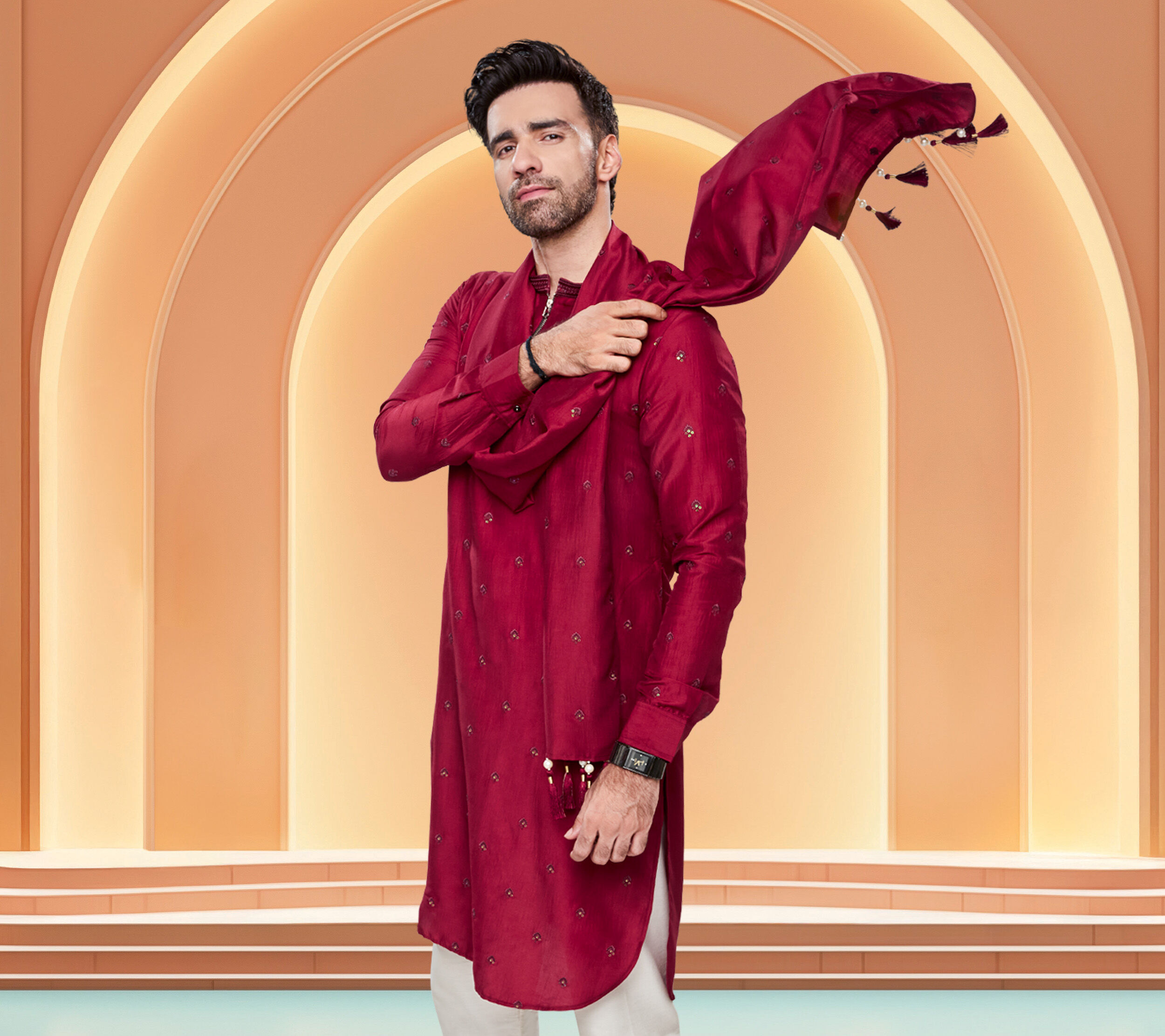 A men in elegant red kurta for wedding party